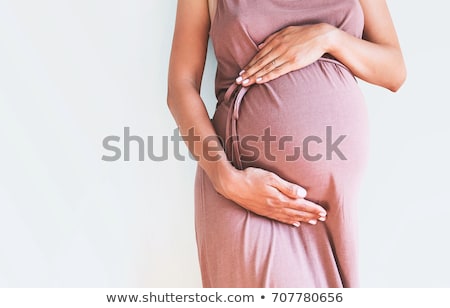 Foto stock: Pregnant Woman On A Pink