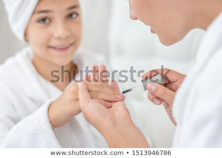 Foto stock: Woman Paints His Face