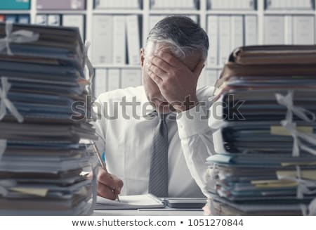 Stockfoto: An Overwhelmed Executive