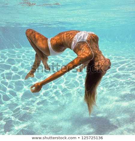 Zdjęcia stock: Young Beautiful Woman Posing In Fashionable Swimsuit