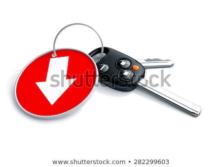 Stock photo: Set Of Car Keys And Keyring Isolated On White With Arrow On Red
