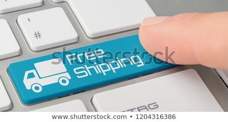 Stockfoto: Free Delivery Concept Person Click Keyboard Button