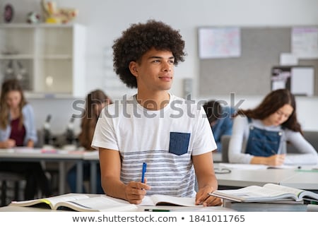 Stockfoto: School Boy Thinking In Class