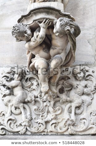 Stok fotoğraf: Architectural Detail On Stone Sculptures Of Two Angels At Grand