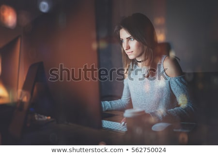 Stock foto: Businesswoman With Papers Working At Night Office