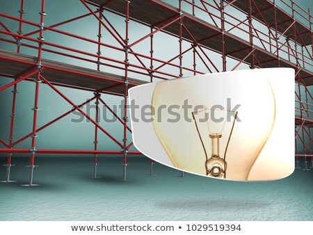 Foto stock: Lightbulb In Front Of Scaffolding In Green Room
