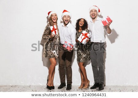 [[stock_photo]]: Group Of Cheerful Smartly Dressed Friends Celebrating