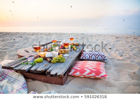 Stock photo: Picnic On The Beach At Sunset In The Style Of Boho