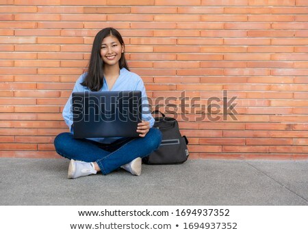 ストックフォト: Portrait Of Smiling Woman Using Laptop