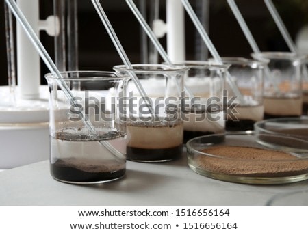 Foto stock: Researcher With Beaker