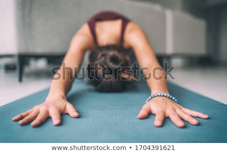 Yoga Home Stretching Meditation Woman Doing Childs Pose Warm Up Stretch In Living Room Home Hands T Zdjęcia stock © Maridav