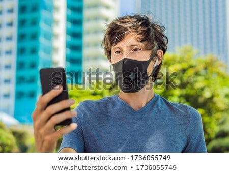 Stock photo: Face Recognition In Medical Mask Using Artificial Intelligence And Neural Networks Biometric Scanni