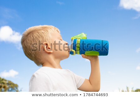 Zdjęcia stock: Thirsty Young Boy