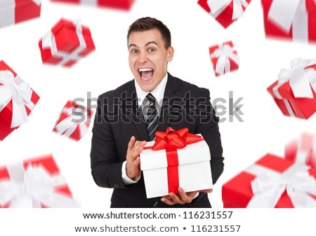 Сток-фото: Portrait Of Young Business Man With Gifts