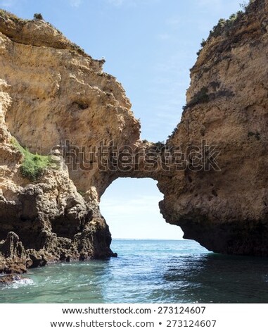 Stockfoto: Rocks And Cliff Like Bridge In Lagos Porugal