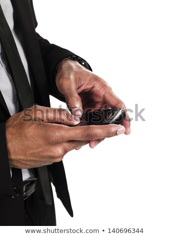 Foto stock: Mid Section Of Businessman Holding Mobile Phone