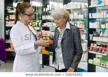 Stock foto: Apothecary And Woman With Drug At Pharmacy