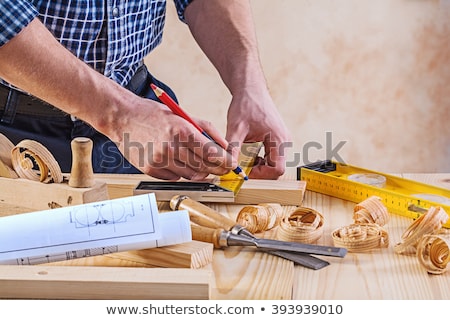 Foto stock: Carpenter Working With A Chisel