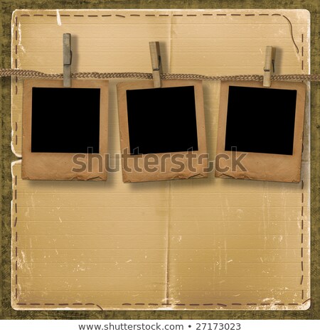 Foto stock: Old Slide Are Hanging In The Row On The Abstract Background