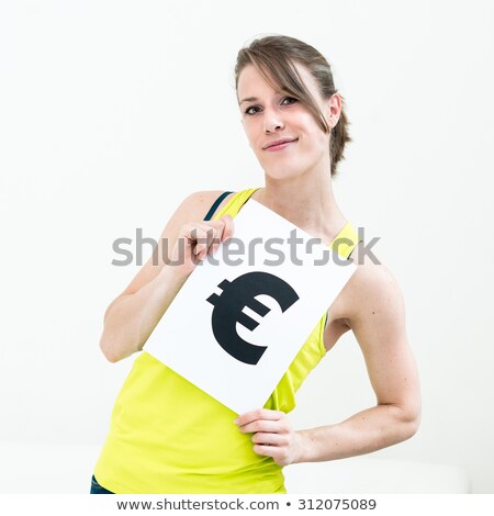 Portrait Young Woman With Board Euro Mark [[stock_photo]] © ilolab