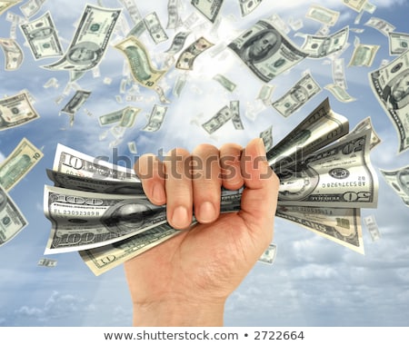 Foto stock: Wealth Idea In A Metaphor The Hand Holds Some Dollars