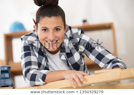 Foto stock: Carpenters Making Eye Contact