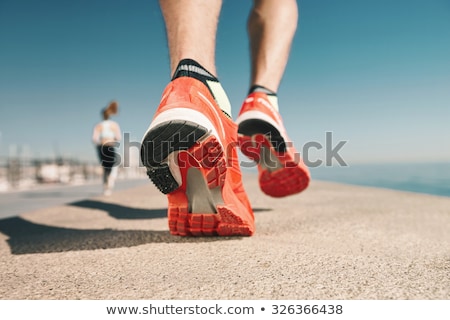 Stock photo: Walking Or Running Legs Sport Shoes