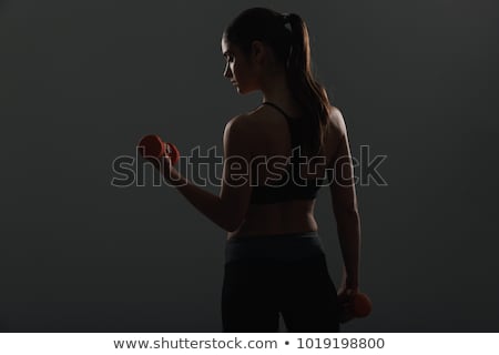 Сток-фото: Woman Holding Red Dumbbell