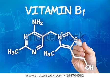 Stock fotó: Hand With Pen Drawing The Chemical Formula Of Vitamin B1