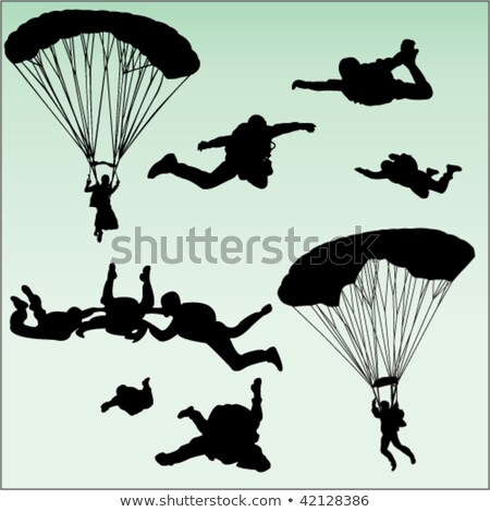 Stock fotó: Silhouette Of Skydiver At Sky