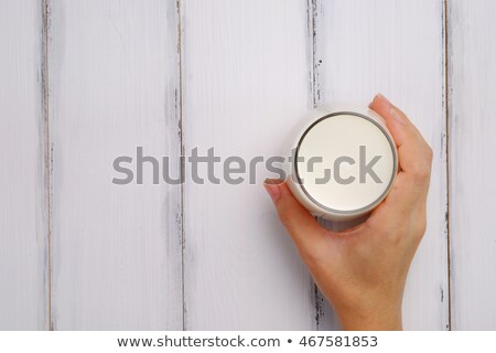 Foto stock: Young Woman With A Glass Of Milk Top