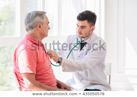 Stock fotó: Doctor Examining A Heart