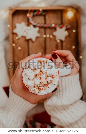 Foto stock: Close Up Of Happy Woman With Cocoa Cup At Home