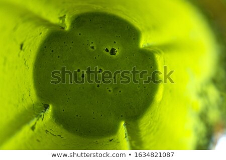 Foto stock: Close Up Of Jug With Green Juice And Vegetables