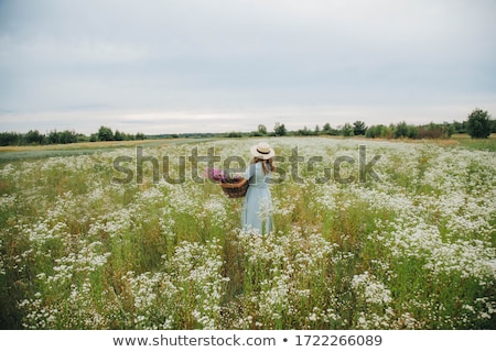Stock fotó: Blond Woman With Flowers