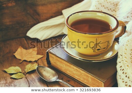 Stock photo: A Cup Of Coffee On The Background Of An Old Wooden Table A Heart For Coffee St Valentines Day Con