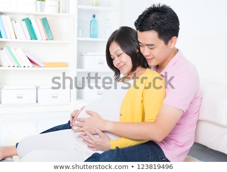 Foto d'archivio: Husband And 8 Months Pregnant Wife