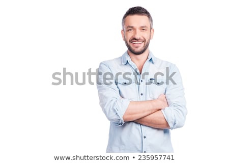 Foto stock: Happy Handsome Man With Arms Crossed