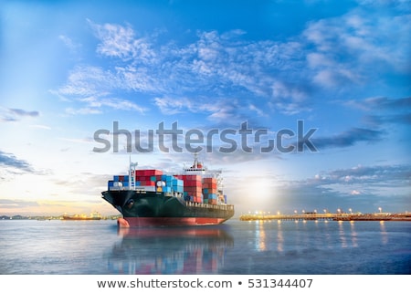 Stock photo: Trading Seaport With Cranes Cargoes And The Ship