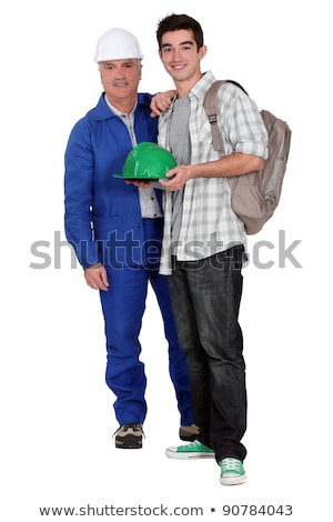 Foto d'archivio: Experienced Tradesman Posing With His New Apprentice