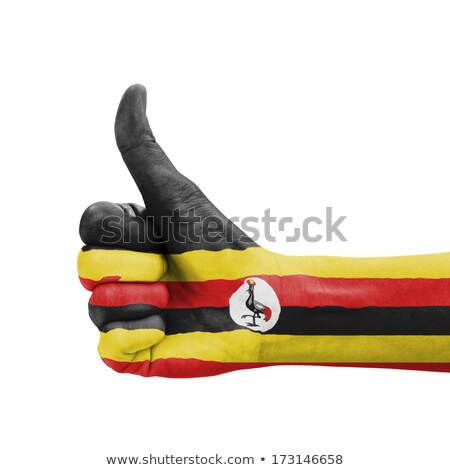 Stock fotó: Uganda National Flag Thumb Up Gesture For Excellence And Achieve