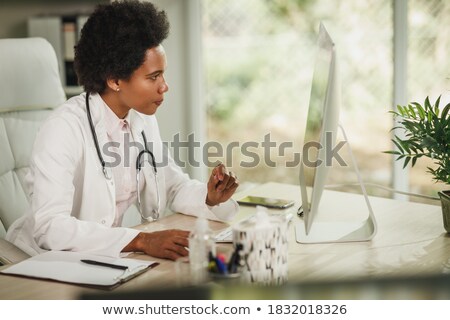 Stock photo: Doctor Looking To Screen