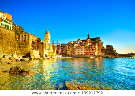 Foto stock: Vernazza Village Church Rocks And Sea Harbor On Sunset Cinque