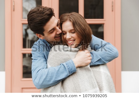 Сток-фото: Portrait Of A Lovely Smiling Girl Covered In Blanket