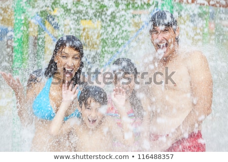 Foto stock: Father And Son Have Fun At The Water Park