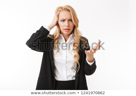 Сток-фото: Confused Angry Displeased Business Woman Posing Isolated Over White Background Wall Looking Camera