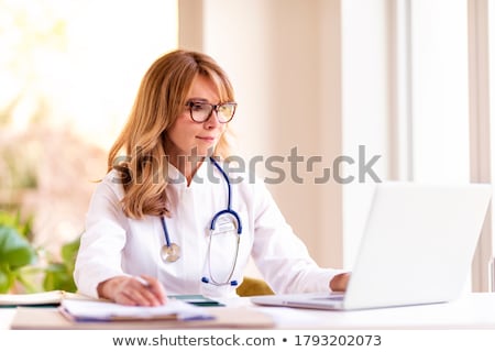 Zdjęcia stock: Aged Female Doctor Working In The Clinic