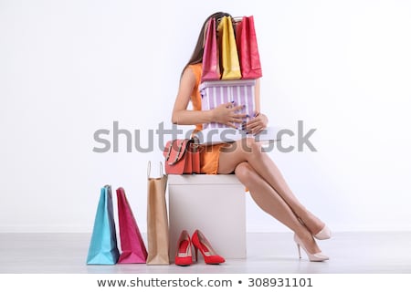 Stok fotoğraf: Beautiful Young Woman With Shopping Bags And Boxes Isolated On Pink