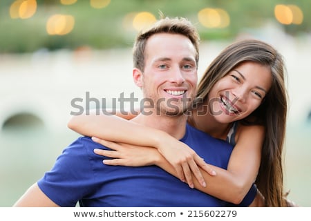 Stock photo: Happy Interracial Young Couple Woman And Caucasian Man Vacation Couple On Beach Together In Love