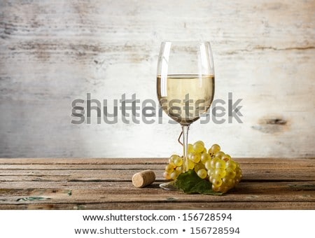 Wineglass With White Wine And Grape Zdjęcia stock © grafvision